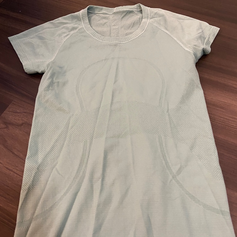 Light blue greyish Lululemon swiftly tech shirt